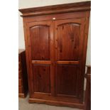 A Victorian style pine bedroom suite comprising double wardrobe, chest of 4 long and 2 short