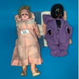 A Victorian wax headed doll and another mid 20th Century doll