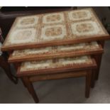 A 1970's nest of 3 occasional tables with tile tops