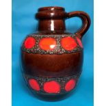 A large bulbous 1970's West German Pottery 'Lavaware' single handle vase