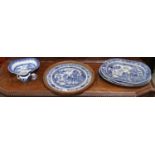 Three 19th century blue & white meat plates; a similar dish and jug; a Willow pattern embroidered
