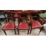 A Regency set of 7 (6 + 1) mahogany dining chairs, with bar backs and turned centre rails, on turned