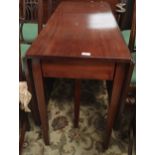 A Georgian mahogany drop leaf dining table with rounded rectangular top, on square tapering legs,