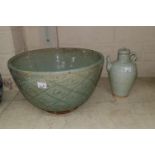 A large Chinese Celadon glazed bowl , diameter 24cm (cracked and restored) a Celadon crackle