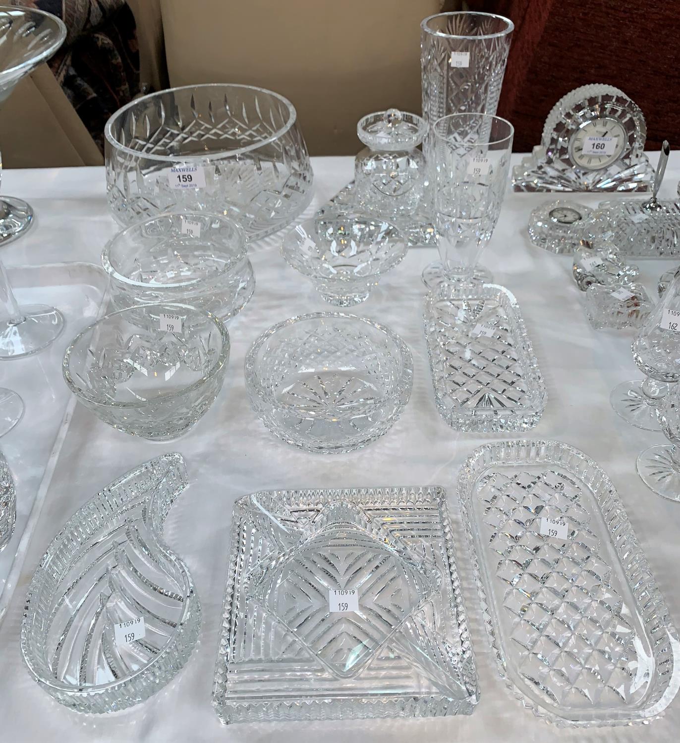 A Waterford Crystal fruit bowl, diameter 9.5"; other Waterford pieces: 4 small bowls; 3 dishes; etc.