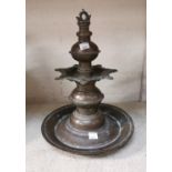 A Buddhist cast metal oil lamp