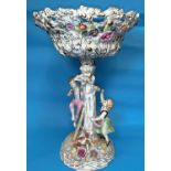 A Dresden style large encrusted table centre, the column in the form of 2 children and a dog,