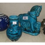 Two Persian blue glaze pottery items, a horse and a vase