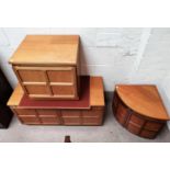 A teak single door chest, a similar double door corner fitting chest and a teak coffee table