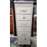 A tall thin white painted six drawer bedroom chest