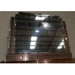 An Art Deco bevelled glass mirror, bordered on 3 sides with frosted peach glass panels with