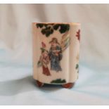 An early 20th century Chinese oval brush pot decorated with sages and boys in landscape, on 4