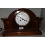 An early 20th century mahogany cased mantel clock, 8 day movement striking on gong