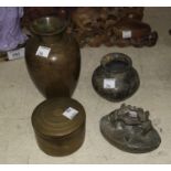 An Indian brass foot scrubber and four other Indian items and metalware