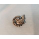 A silver Georg Jensen brooch numbered 309, bird on a fern marked 925 Sterling Denmark