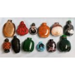 A collection of 12 Chinese snuff bottles, 7 hardstone and 5 lacquer/glass/etc.