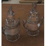 A pair of Nigerian Benin style covered pots in cast bronze, 18 cm