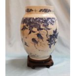 A 19th century Chinese blue & white ovoid decorated with birds in flowering branches, height 10",