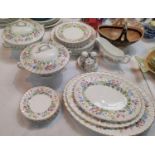 A Royal Doulton ' Easter Morn' dinner service including tureens, meat plates etc