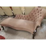 A mid Victorian walnut chaise longue with spoon back, carved scrollwork frame, on short cabriole