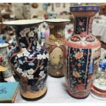 Three modern large oriental vases decorated with traditional motifs