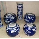 Four Chinese blue and white Prunus ginger jars (no lids) and a blue and white Chinese sleeve vase (