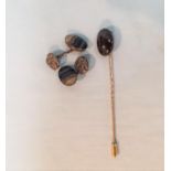 A pair of silver and blue John cufflinks and an Edwardian yellow metal and garnet set tie pin