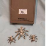 A boxed Butler & Wilson costume set of a spider brooch and matching earrings