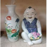 A Chinese ceramic figure of a young boy, height 30cm, A Chinese porcelain vase (damage to neck