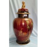 A mid 20th century Carltonware temple jar, Rouge Royale stork pattern, domed cover with gilt Dog