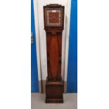 A 1930's oak cased Westminster chiming granddaughter clock