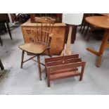 A Windsor stick back arm chair and a teak magazine rack