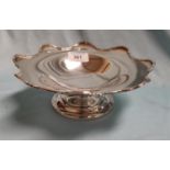 A circular scalloped silver dish on raised foot Birmingham 1923 9.5oz