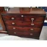A Georgian boxwood bound mahogany chest of 3 long and 2 short drawers, with brass drop handles on