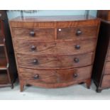 A Victorian mahogany bow front chest of three long and two short drawers with ebony inlay with