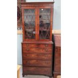 A Georgian mahogany secretaire/bookcase, the upper section enclosed by 2 diamond pane doors, the
