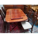A 1960's/70's Skovby rosewood dining suite, comprising extending table with 2 spare leaves, extended