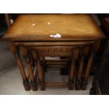 An oak nest of 3 Jacobean style occasional tables