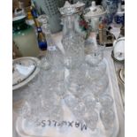 A Waterford decanter; another; a set of 4 cut saucer champagnes; other cut drinking glasses