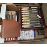 An oak boxed set of ivory handled knives and forks and a selection of other boxed cutlery