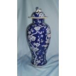 A 19th century Chinese porcelain covered vase, baluster shaped with underglaze blue decoration, 38