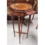 A Sheraton marquetry inlaid plant stand with candle shelf, octagonal tray top