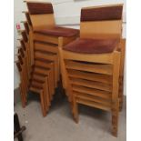 A 1970's set of 15 designer stacking chairs in lightwood faced plywood