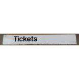 An enamel white railway tickets sign