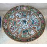 A large Chinese famille rose charger with polychrome decoration 34cm diameter