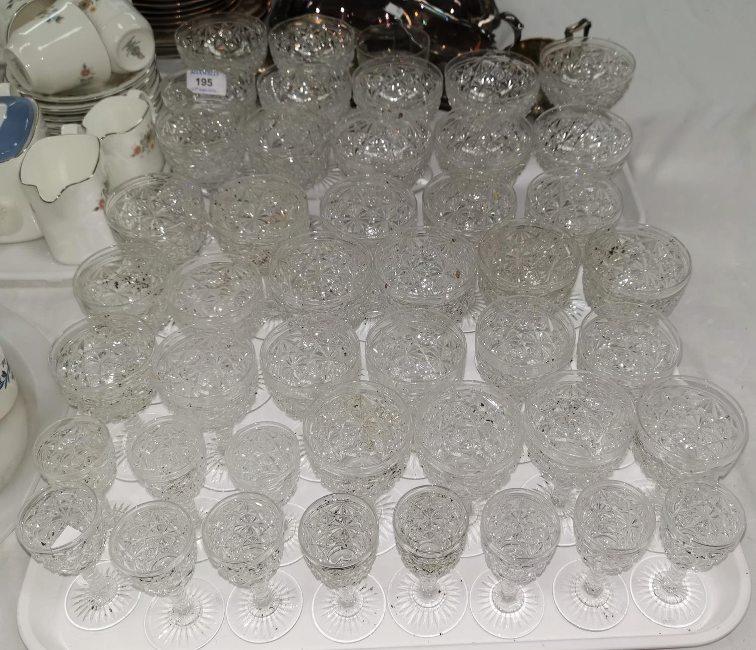 A suite of 3 sizes of cut drinking glasses; a silver plated entrée dish; etc.