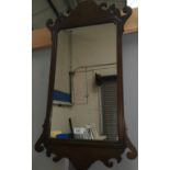 A pair of oak framed Chippendale style mirrors and another gilt mirror