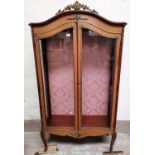 A Louis XV style vitrine by Epstein, in crossbanded kingwood with marquetry work extensive ormolu