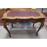 A Louis XV style Epstein bureau plat in quarter veneered kingwood and walnut, of rectangular