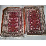 A pair of Turkish saddle bag covers, hand knotted with cream ground, 34" x 25"